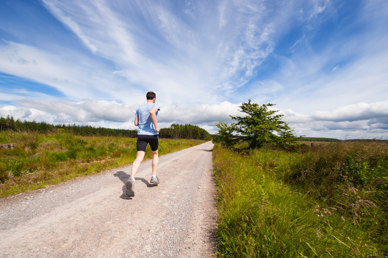 runner on dirt road